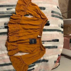 Woven off the shoulder top, mustard color.